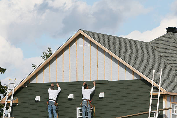 Professional Siding Installation technician working in Greensboro, MD